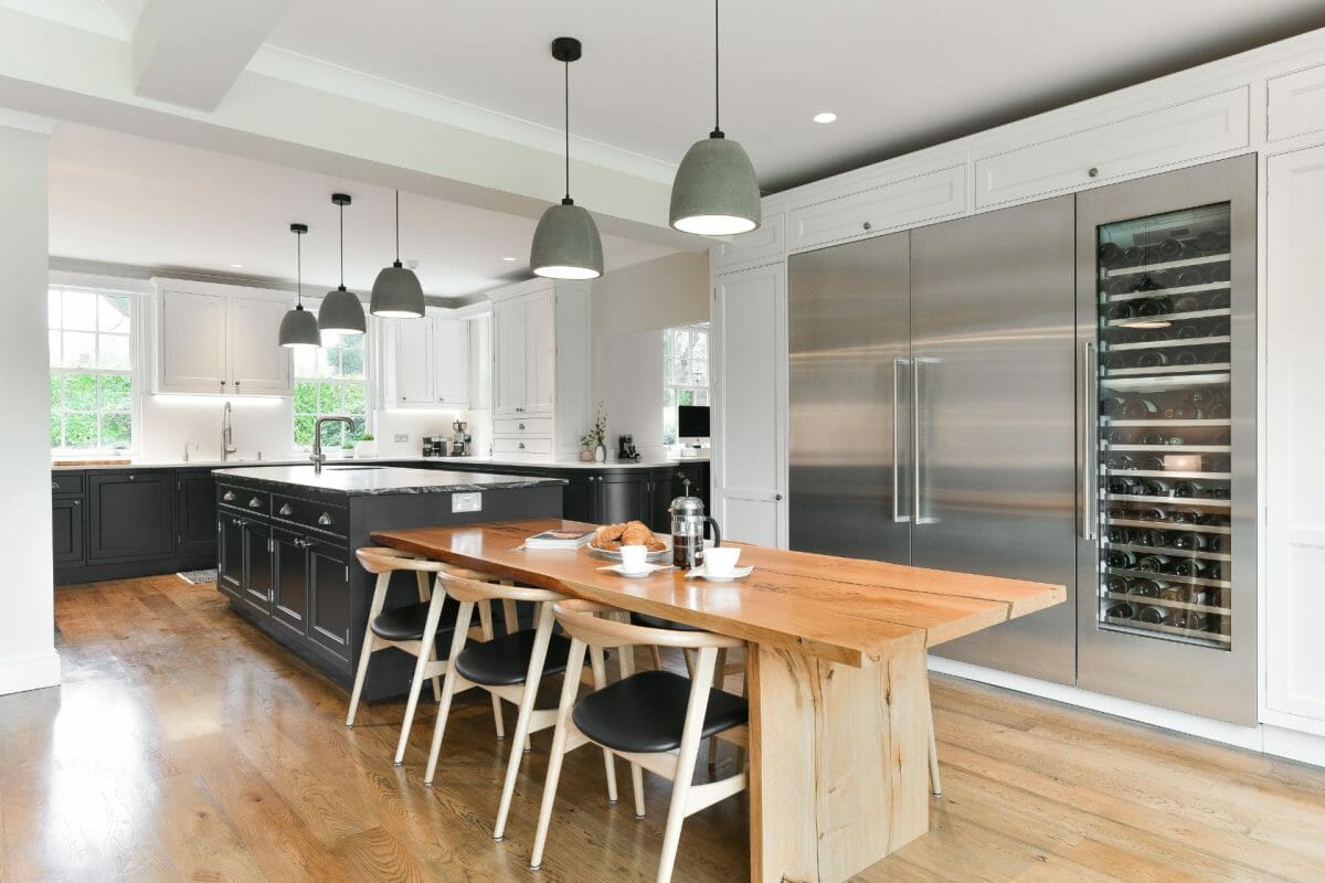 Dark Shaker Kitchen with Wine Fridge and Dining Table